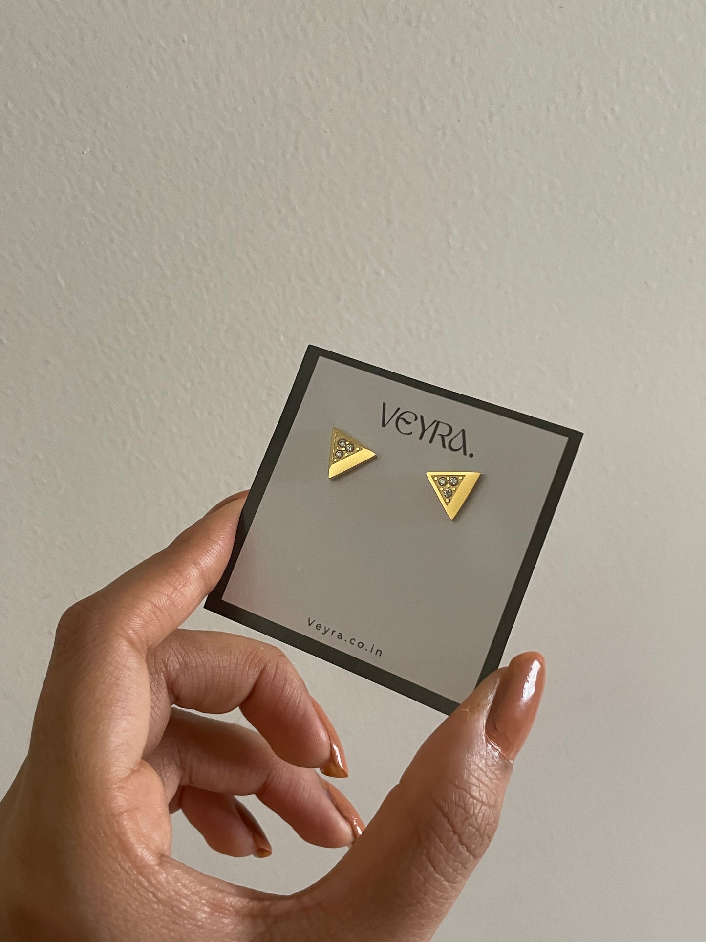 STUDDED TRIANGLE